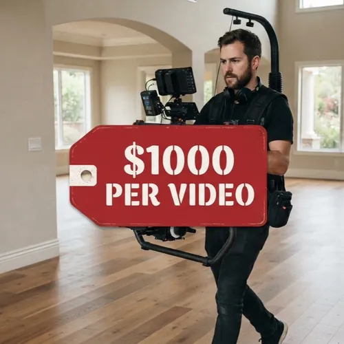 A videographer with a pro camera rig in an empty listing — the costly old way